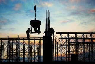 Construction professionals working on a large project